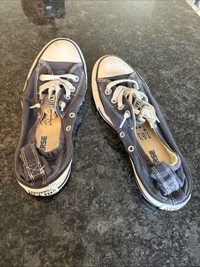 Converse women’s Low-Top Sneakers in Navy and White